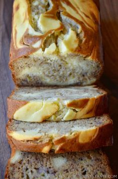 sliced loaf of bread sitting on top of a wooden table