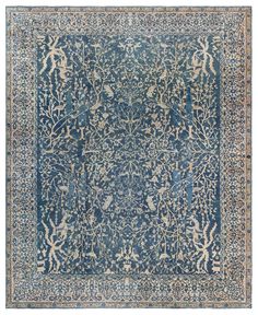 Antique Indian Blue Handmade Wool Rug Size: 13'8" × 16'9" (416 × 510 cm) An early 20th century Indian antique rug, the blue field with an overall whimsical design in beige of blossoming trees and exotic animals within a camel border with floral motifs and architecturally-inspired vinery. Blue Indian Rug, Indian Blue, Indian Rug, Indian Rugs, Blossom Trees, Handmade Wool Rugs, Antique Rug, Rugs And Carpet, Exotic Pets