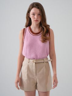 This is a casual and trendy top by VLETI that is made out of high quality and sturdy material. With distinctive mood of the design and comfortable wear, you can style it for your feminine summer outfit.- Relaxed regular silhouette- Ribbed round neckline- Trendy and feminine casual mood Spring Chic Tank Sweater Vest, Chic Tank Sweater Vest For Spring, Beige Crew Neck Vest For Summer, Chic Pink Tank Vest, Trendy Knit Vest For Day Out, Trendy Sleeveless Sweater Vest For Day Out, Trendy Sweater Vest For Summer Day Out, Summer Knit Vest With Crew Neck, Trendy Spring Tank Sweater Vest