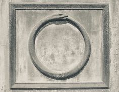 a black and white photo of a circular object