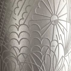 close up view of an etched glass vase