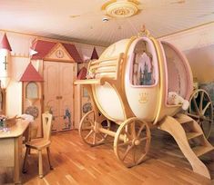 a room with a horse drawn carriage in it's center and lots of furniture on the floor