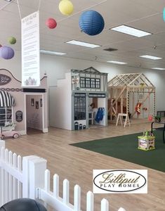 an indoor play area with toys and decorations