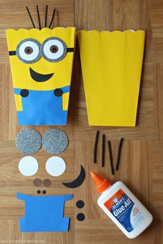 paper cut out to look like a despicable minion with glue on it