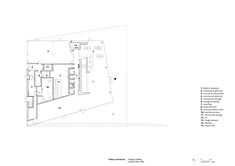 the floor plan for an apartment building with three floors and two levels, in white