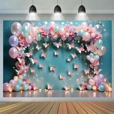 a room with balloons and butterflies on the wall