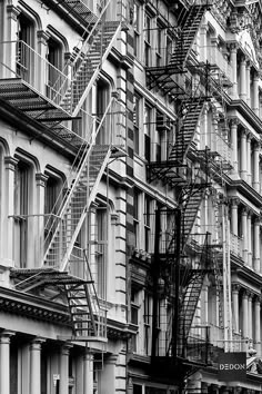 black and white photograph of fire escapes in new york city