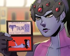 a cartoon character holding up a card with the word talon on it