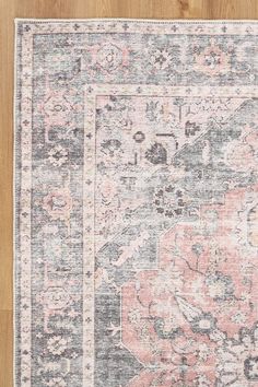 Add a touch of vintage charm to your space with Hugo! This area rug has a unique design, inspired by original vintage rugs from Turkey. The faded colors and grey border work well with its floral motifs. Featuring faded pink, gray, and light blue tones giving it an unmistakable boho charm, adding warmth to any space.Mad Pink And Grey Rug, Pink Boho Rug, Girls Room Rugs, Basement Room, Basement Renovation, Faded Colors, Muddy Paws, Teal And Grey, Grey Beige