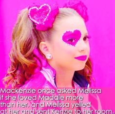 a woman with pink makeup and heart shaped decorations on her face, in front of a pink background