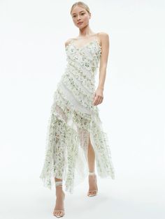 Green Sondra Lace Ruffled Maxi Dress by Alice and Olivia V-neck Lace Maxi Dress With Ruffles, Feminine V-neck Spring Gown, Feminine V-neck Gown For Spring, Elegant Evening Dress With Lace Trim For Spring, Elegant Spring Evening Dress With Lace Trim, Chic Floral Embellished Maxi Dress For Spring, Chic V-neck Spring Gown, Spring Lace Evening Dress, Midi Length Lace Dress With Ruffles For Wedding