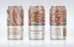 three cans of koko buni beer on a white background