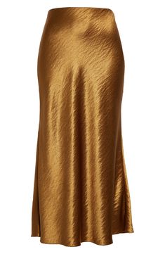 Hammered texture elevates the elegant look of this bias-cut satin skirt in a burnished golden hue that evokes autumnal splendor. 36 1/2" length (size 8) Hidden side-zip closure 100% polyester Dry clean Imported Designer Clothing Gold Maxi Skirt, Glamorous Gold Skirt For Evening, Glamorous Gold Evening Skirt, Glamorous Gold Long Skirt, Glamorous Long Gold Skirt, Elegant Metallic Long Skirt, Luxury Fitted Gold Skirt, Gold Long Skirt For Formal Occasions, Gold Satin Party Skirt