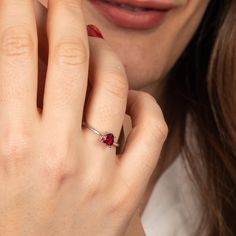 RED ० RUBY ० HEART ० 925 STERLING SILVER ० RING ० FOR HER ★Make a bold and romantic statement with our Ruby Heart Ring. Crafted with love and precision, this stunning piece features a radiant red ruby heart, symbolizing passion and love. Set in 925 sterling silver, the ring exudes elegance and sophistication. ★Whether it's a special Valentine's Day gift or a token of affection for yourself, this dainty handmade ring is the perfect accessory to showcase your unique style. Its hypoallergenic and nickel-free materials ensure comfortable wear, while the vibrant ruby adds a touch of glamour to any outfit. ★Indulge in the timeless beauty of our Ruby Heart Ring and let your inner beauty shine. Order now and embrace the allure of this exquisite piece. D E T A I L S ★ MATERIALS: High-Quality 925 St Ruby Silver Ring, Ruby Heart Ring, Ruby Heart, Radiant Red, July Birthstone Jewelry, Heart Stone, Ruby Stone, Valentine Special, Wooden Jewelry Boxes