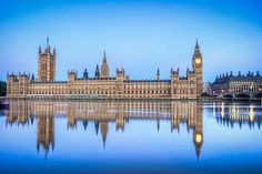 the big ben clock tower towering over the city of london