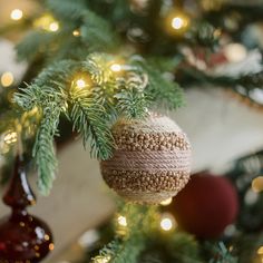 an ornament hanging from a christmas tree