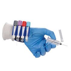 a hand in blue glove holding four different colored tubes and a syssor with one needle