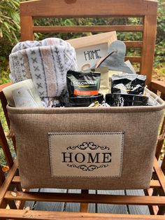 a basket filled with items sitting on top of a wooden chair