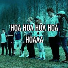 a group of people standing next to each other in front of trees with the words, oh hoa hoa hoa