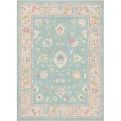 a blue rug with an ornate design on the bottom and sides, in various colors