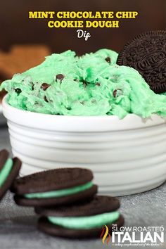 mint chocolate chip cookie dough in a white bowl with oreo cookies on the side