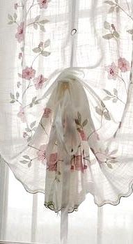 an image of curtains with flowers on them and the words save in red above it