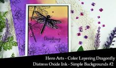 a card with purple flowers and dragonflies on it