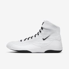 the nike zoom basketball shoe is white and has black accents on the upper half of the shoe