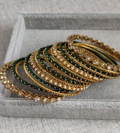 Indian bangle set churiya Bangadi Bangles, Green Bangle For Festive Wedding, Chudiyan Bangles, Choodiyan Bangles, Traditional Green Bangle For Festivals, Colourful Bangles, Party Wear Jewellery, Green Bangles, Beautiful Bangles