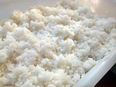 rice in a white bowl on a table