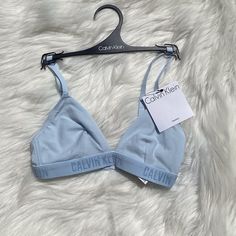 Satin Band Ck Bralette With Embroidered Logo And Adjustable Straps. Ck Under Wear Women Outfit, Casual Blue Fitted Bra, Fitted Calvin Klein Bra For Summer, Calvin Klein Fitted Bra For Summer, Light Blue Summer Bra, Spring Stretch Calvin Klein Bra, Ck Under Wear Women, Under Wears Woman Calvin Klein, Calvin Klein Bra Set