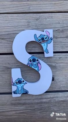 the letter s is made up of cartoon characters