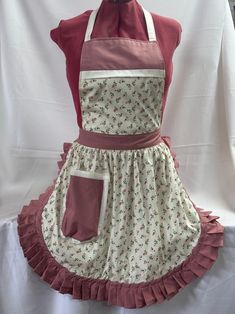 an apron dress is displayed on a table