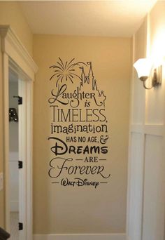 a hallway with a disney quote on the wall