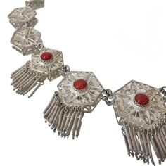 Exquisite delicate vintage filigree necklace in bright silver-tone metal with round red cabochons (stone or glass) circa 1970s  Length: 38.5 cm / 15.1 '' Width: up to 3.8 cm / 1.5 '' Weight: 31.7 grams Beautiful vintage condition, with some minor patina Shipping will be charged only once when ordering multiple items from my shop More quality vintage items in my Etsy shop: https://www.etsy.com/shop/styled64 Red Metal Filigree Jewelry, Red Bohemian Filigree Jewelry, Bohemian Red Filigree Jewelry, Antique Silver Filigree Metal Necklace, Ornate Red Filigree Jewelry, Ornate Handmade Red Necklace, Red Bohemian Necklace For Formal Occasions, Red Vintage Filigree Necklace, Vintage Adjustable Filigree Necklace