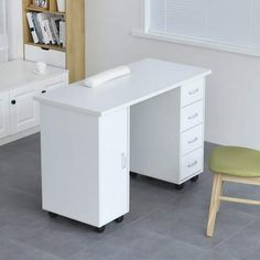 a white desk with drawers and a chair in front of it on a tile floor