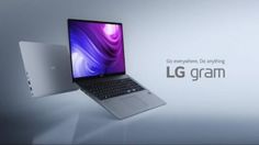 a laptop computer sitting on top of a white table next to a wall with the words lg gramm