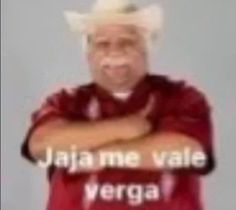 a man in a red shirt with his arms crossed and the words jaja me vale vergoa on it