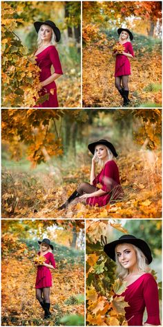 a woman in a red dress and black hat posing for the camera with autumn leaves around her