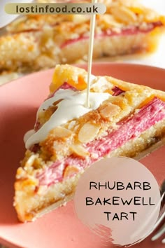 a pink plate topped with a slice of rhubarb bakewell tart