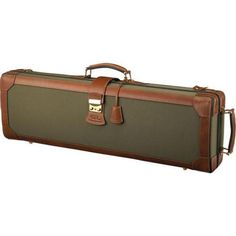 a brown and green suit case sitting on top of a white background