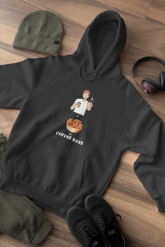 "Get ready for a brew-tiful time with our Coffee Date Hoodie! ☕🥰 This hilarious unisex hoodie features a bowl of dates and a cup of coffee, creating the perfect 'coffee date' look. It's comfy, it's quirky, and it's ready to add some fun to your wardrobe! Grab yours now and let the laughter brew! #CoffeeDate #FunnyFashion #CozyHumor" 🌟 Trendy Hoodies