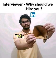 a man is holding an envelope with the words interviewer - why should we hire you?