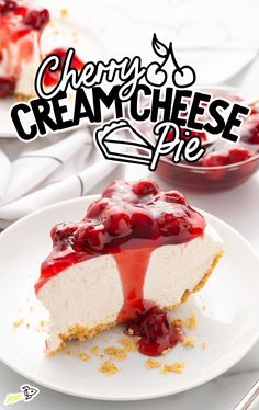 a piece of cheesecake with cherries on top is sitting on a white plate