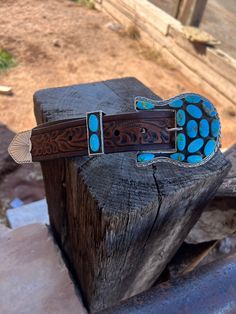 This classic belt and buckle set is handcrafted from genuine leather with a sterling silver buckle featuring Sonoran Gold Turquoise. Perfect for any occasion, the timeless design created by Navajo artist Jimson Belin is an enduring statement of artistry and quality. Proudly made in the USA. Custom so give us a couple of weeks :) If you could kindly measure your waist and message us. Western Style Blue Concho Belt Buckles, Blue Concho Western Belt Buckles, Turquoise Western Belt, Vintage Turquoise Belt With Concho, Turquoise Belt Buckle, Custom Belt Buckles, Turquoise Belt, Custom Belt, Turquoise Jewelry