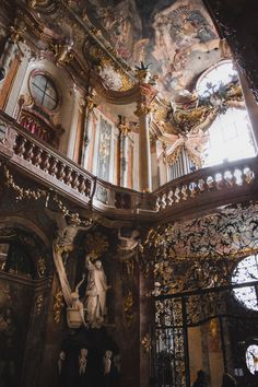 an ornately decorated building with gold and white decorations