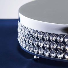 a close up view of the top of a round table with crystal stones on it