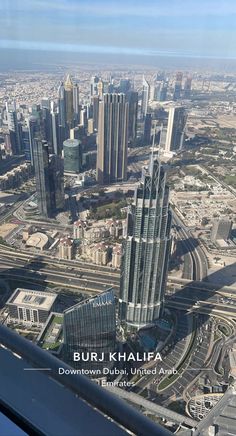 an aerial view of the burj khalea skyscrapers in downtown dubai