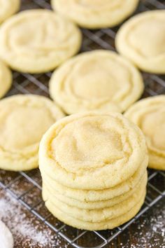 cookies cooling on a wire rack with powdered sugar