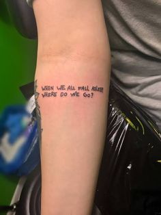 a person with a tattoo saying when we all fall asleep where do we go?